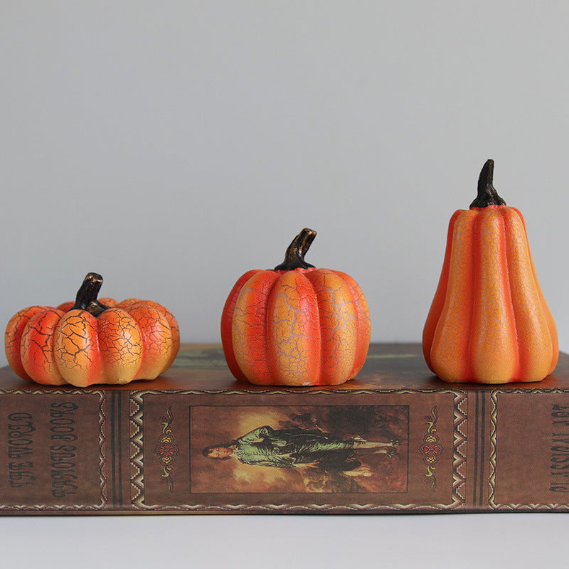 Set of three orange crackle pumpkin lights in short, medium and tall shapes